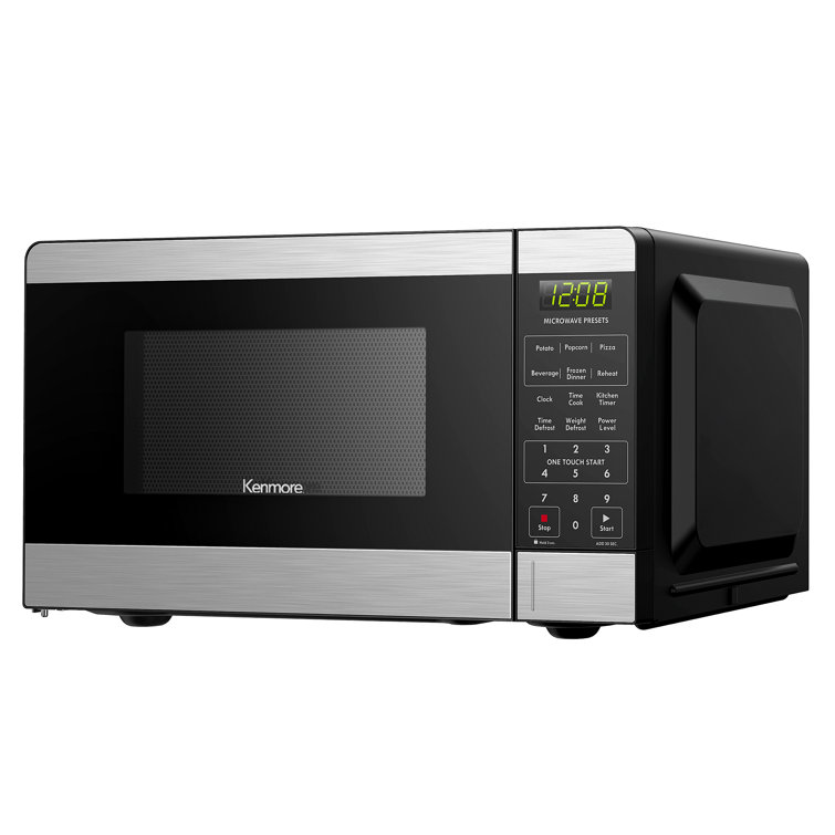 Easy Return Black and Decker 1.1Cu.Ft. 1000W Microwave, microwave on